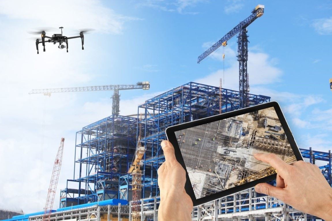 Engineer using a tablet on a construction site
