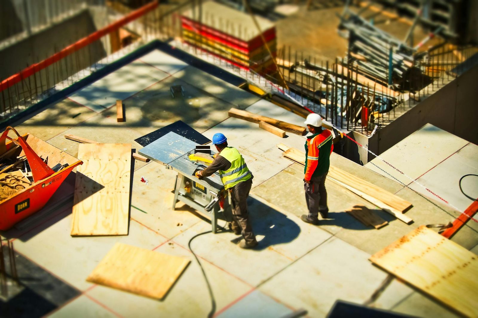 Construction team reviewing plans on site